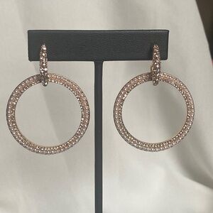 Gold tone earrings with clear stones and faux pearls